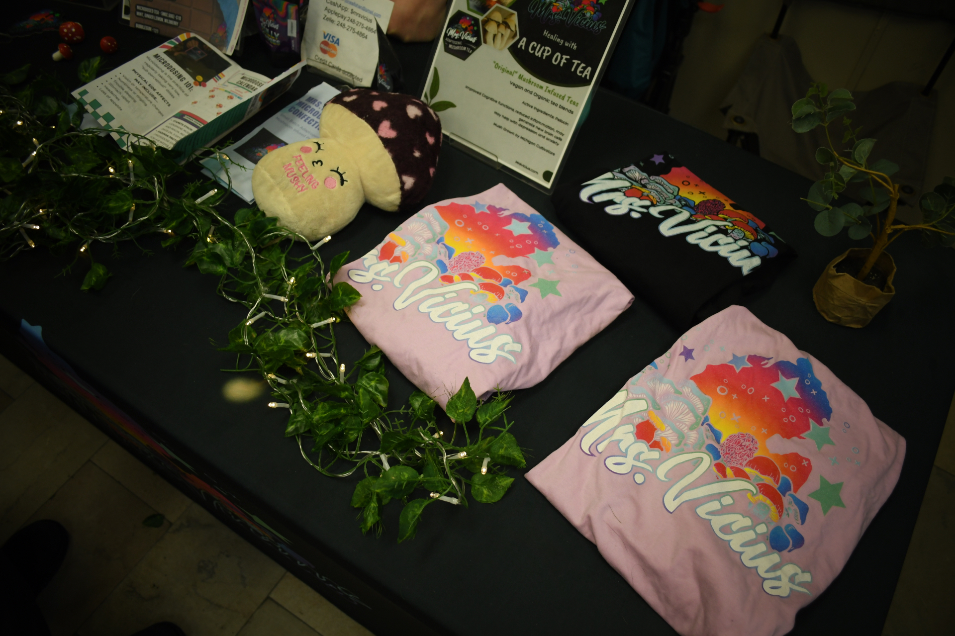 Mrs. Vicius apparel displayed at a community market